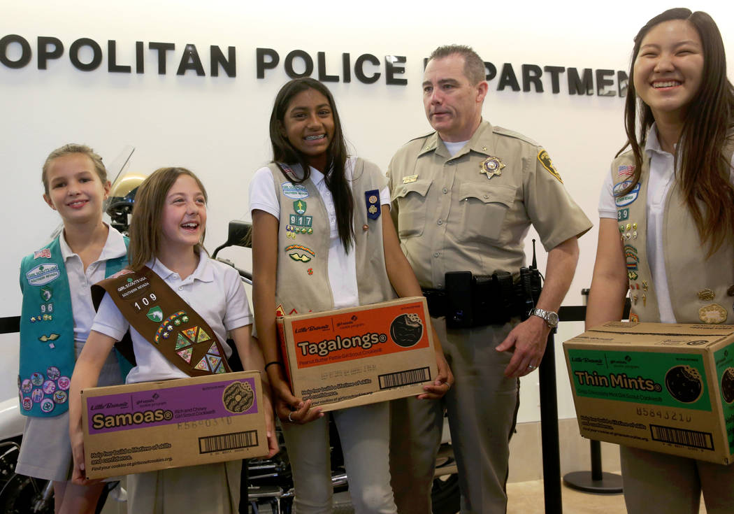 Girl Scouts of Southern Nevada, from left, Kendall Tiffany, 11, Juliette Hoffman, 9, Lily-Renee ...