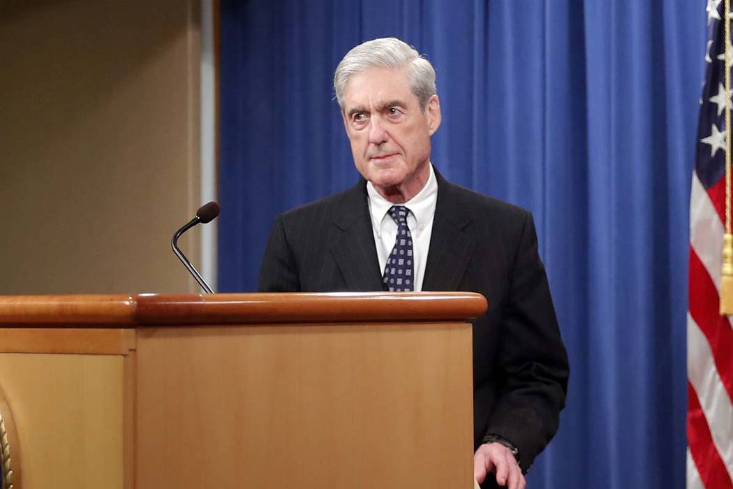 Special counsel Robert Muller arrives to speak at the Department of Justice Wednesday, May 29, ...