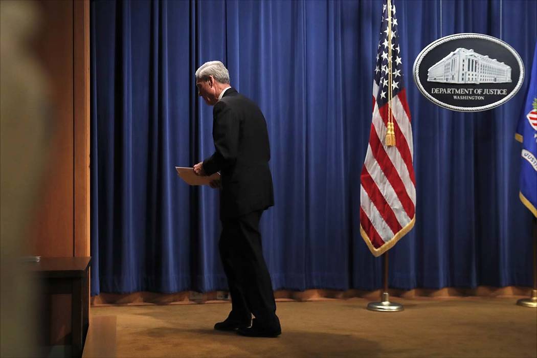 Special counsel Robert Muller leaves the podium after speaking at the Department of Justice Wed ...