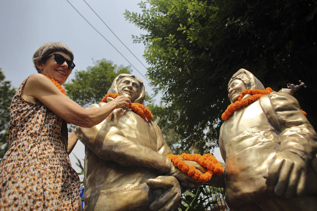 New Zealand mountaineer Edmund Hillary's daughter, Sarah Hillary garlands statues of Hillary an ...