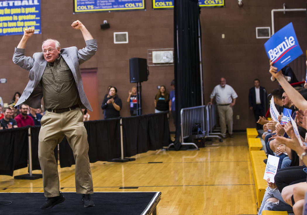 Ben Cohen, co-founder of Ben & Jerry's, cheers in support of Democratic presidential candid ...