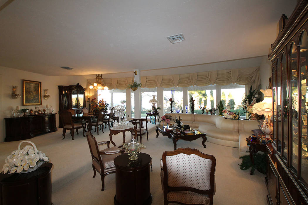 The living room is open and has a window wall. (Mt. Charleston Realty)
