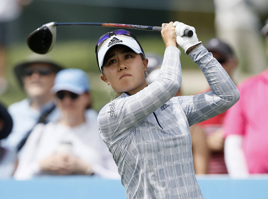 Danielle Kang watches her shot on the second tee during the final round of the LPGA Tour ANA In ...