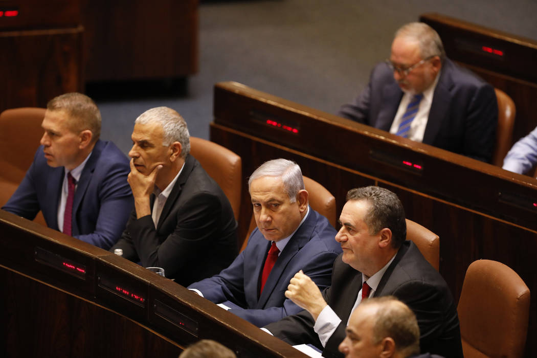 Israeli Prime Minister Benjamin Netanyahu before voting in the Knesset, Israel's parliament in ...