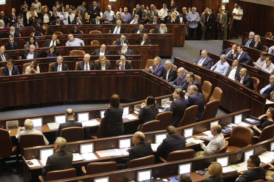 Israeli Ministers and Parliament Members in their chairs before voting in the Knesset, Israel's ...