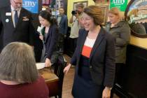 Sen. Amy Klobuchar, D-Minn., greets veterans at a roundtable discussion in Carson City, on her ...