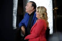 Bar Rescue host Jon Taffer and his wife, Nicole Taffer, between takes during filming at the Com ...