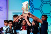 The eight co-champions celebrate after winning the Scripps National Spelling Bee, Friday, May 3 ...