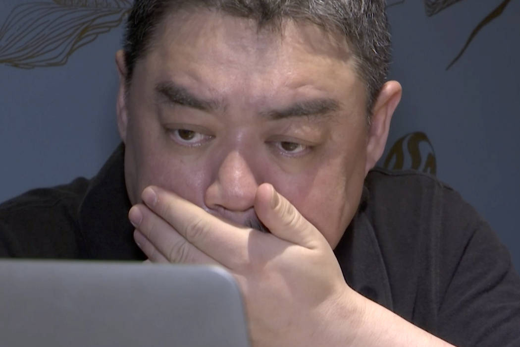 In this image taken from video footage shot on May 22, 2019, Wu'er Kaixi reacts while looking a ...