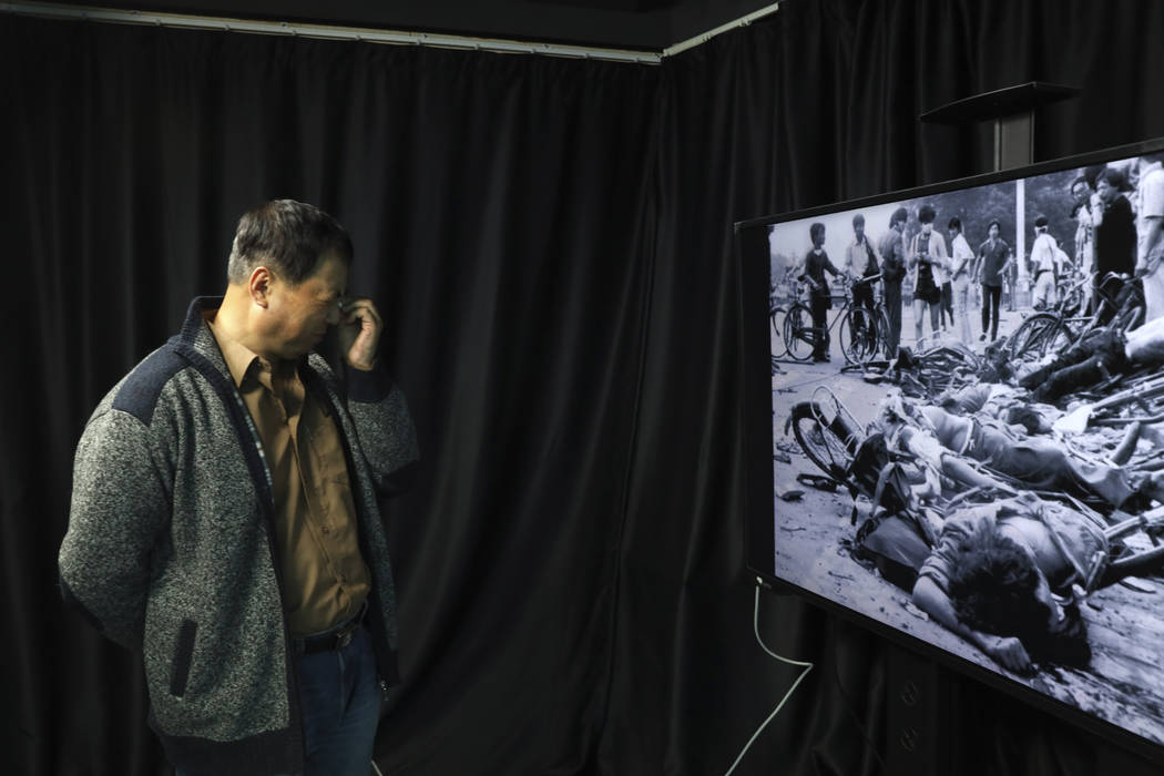 In this April 28, 2019, photo, Dong Shengkun weeps as he recalls being present at the scene see ...