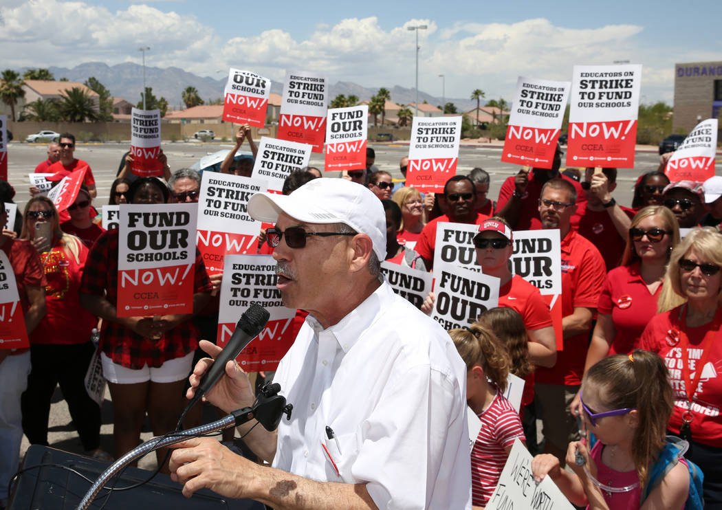 John Vellardita, the Clark County Education Association executive director, speaks as about 50 ...