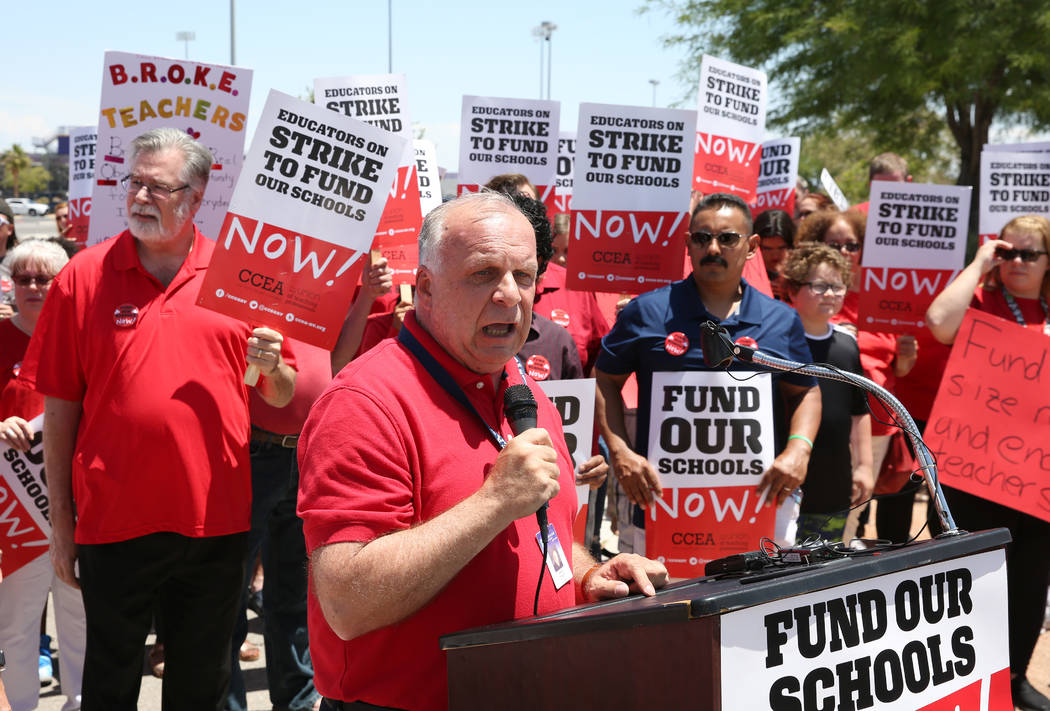 Centennial High School teacher Jim Frazee speaks as about 50 members and supporters of the Clar ...