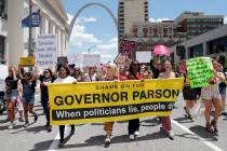 Abortion-rights supporters march Thursday, May 30, 2019, in St. Louis. A St. Louis judge heard ...