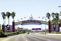 In this Tuesday, Jan. 31, 2017 photo, cars travel one of the roads leading to Walt Disney World ...