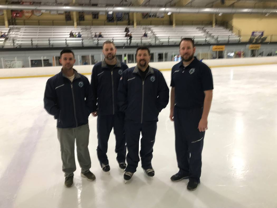 Four of the volunteer team coaches are on ice at the Sobe Ice Arena; from left are Alex Granda, ...