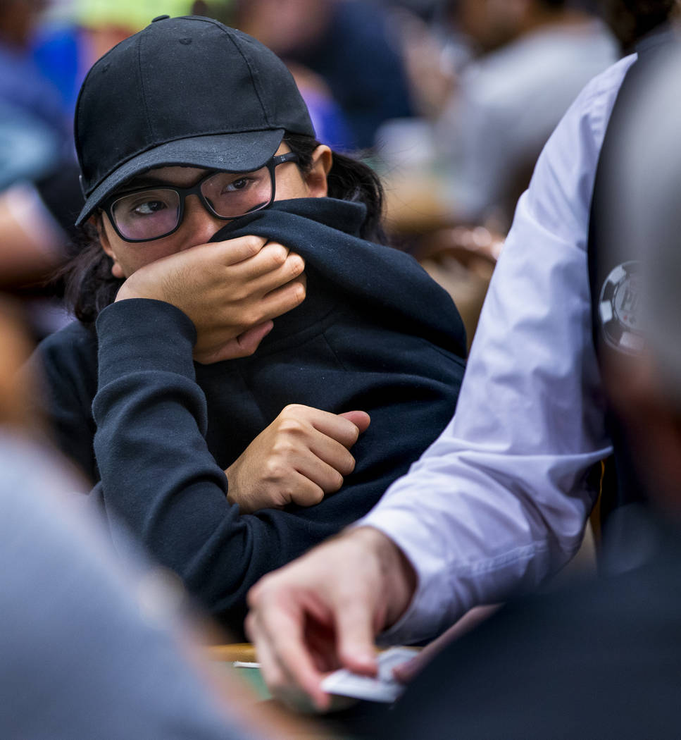 Kwok Chun Kong, of Hong Kong, attempts to keep all tells hidden at the table during the The Big ...