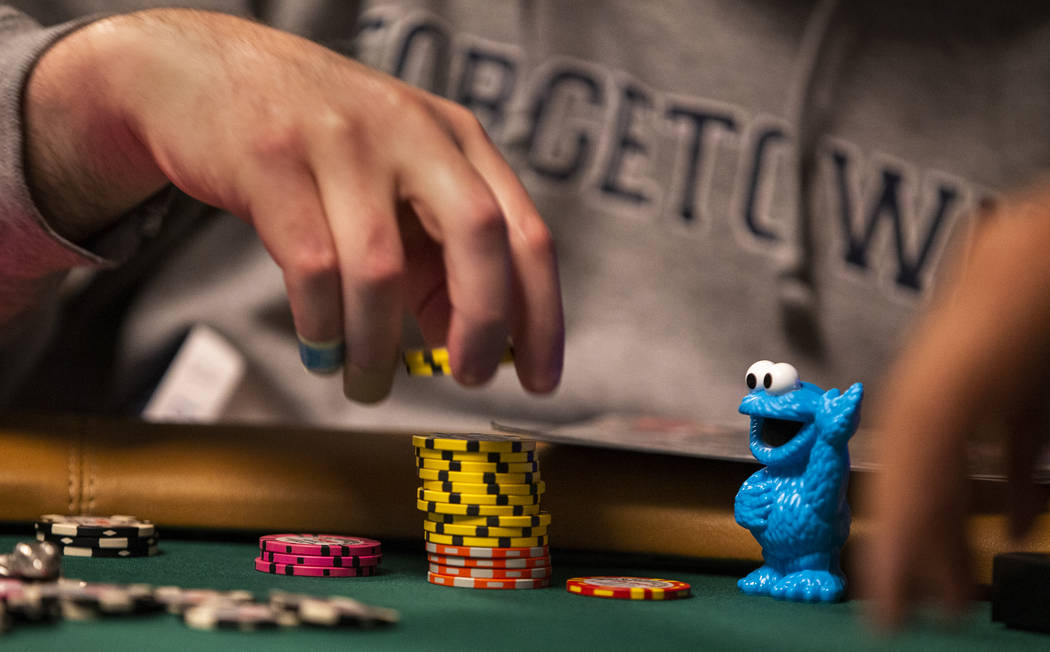 Jeremy Wien, of Westchester, N.Y., has his daughter's Cookie Monster toy as a lucky charm durin ...