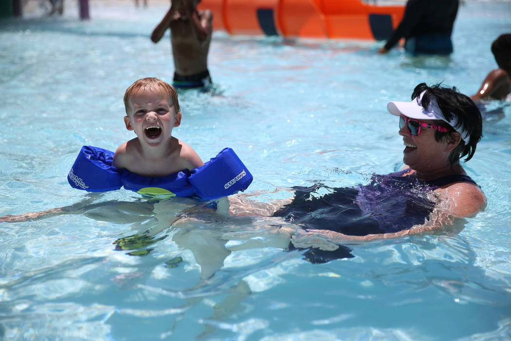 Missy Sargent, right, and grandson Malaki, 4, swim together during the annual Ward 4 Summer Spl ...