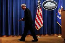 Special counsel Robert Mueller walks from the podium after speaking at the Department of Justic ...