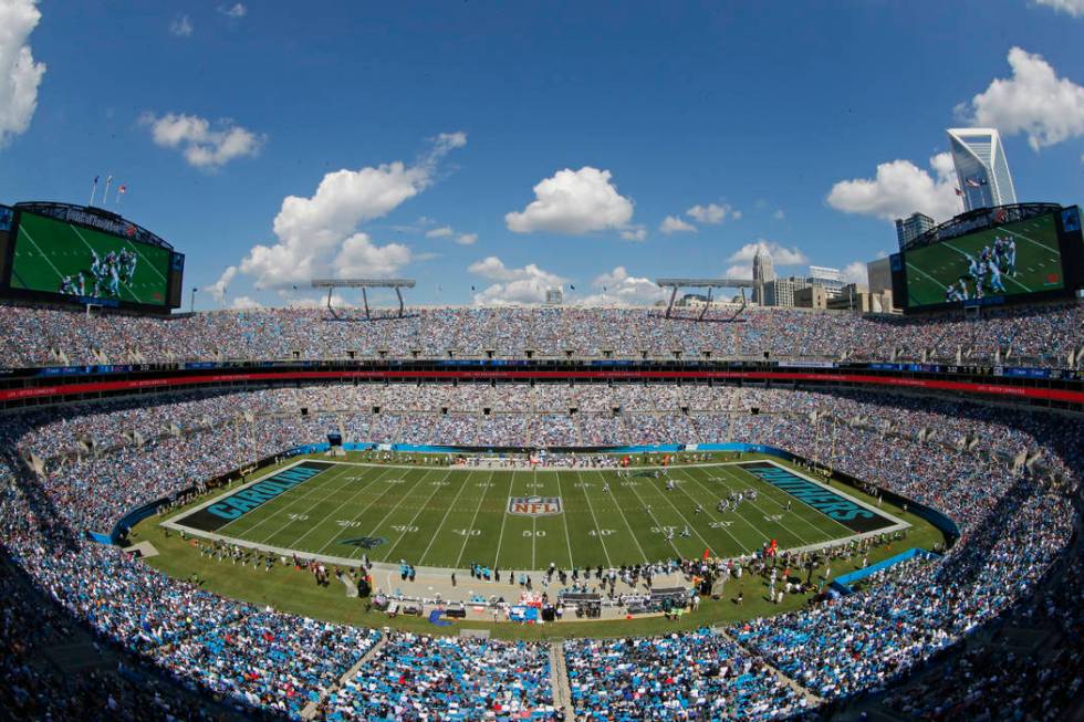 A general view of fans watches the action in the second half of an NFL football game between th ...