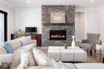 Stone fireplaces are not new, but having the stone go floor to ceiling is especially popular no ...