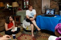 In this Friday, May 31, 2019, photo, Oriana Shulevitz Rosado, left, and Donna West watch as Dem ...