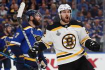 Boston Bruins center Sean Kuraly (52) celebrates after scoring against the St. Louis Blues duri ...