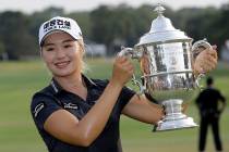 Jeongeun Lee6 of South Korea, holds the championship trophy after winning the final round of th ...