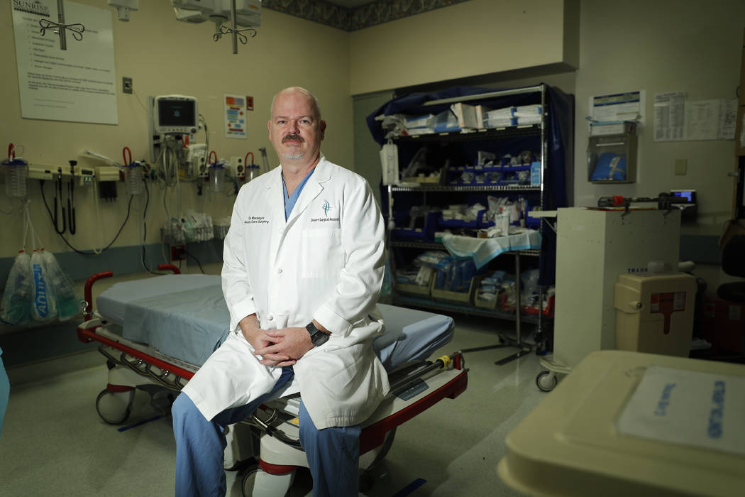 Dr. Dave MacIntyre poses May 29, 2019, for a portrait in the emergency room of the Sunrise Hosp ...