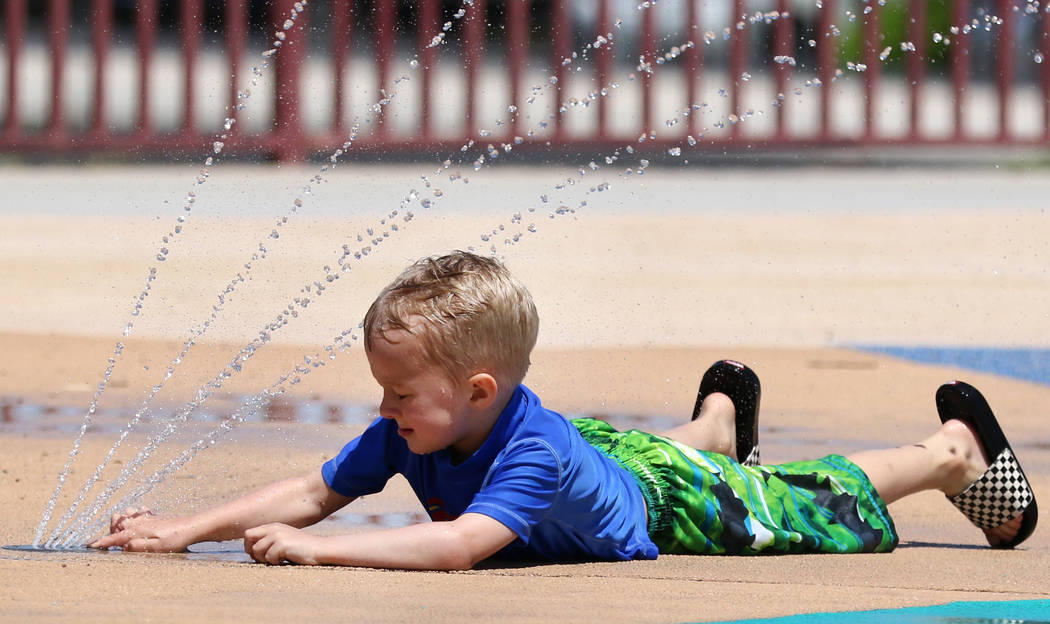 Charlie, 3, who declined to give his last name, plays at Paseo Vista Park on Monday, June, 3 20 ...