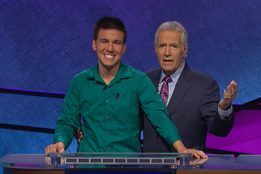 James Holzhauer and Jeopardy! host Alex Trebek (Jeopardy Productions, Inc.)