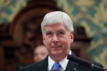 FILE - In this Tuesday, Jan. 23, 2018, file photo, Michigan Gov. Rick Snyder delivers his State ...