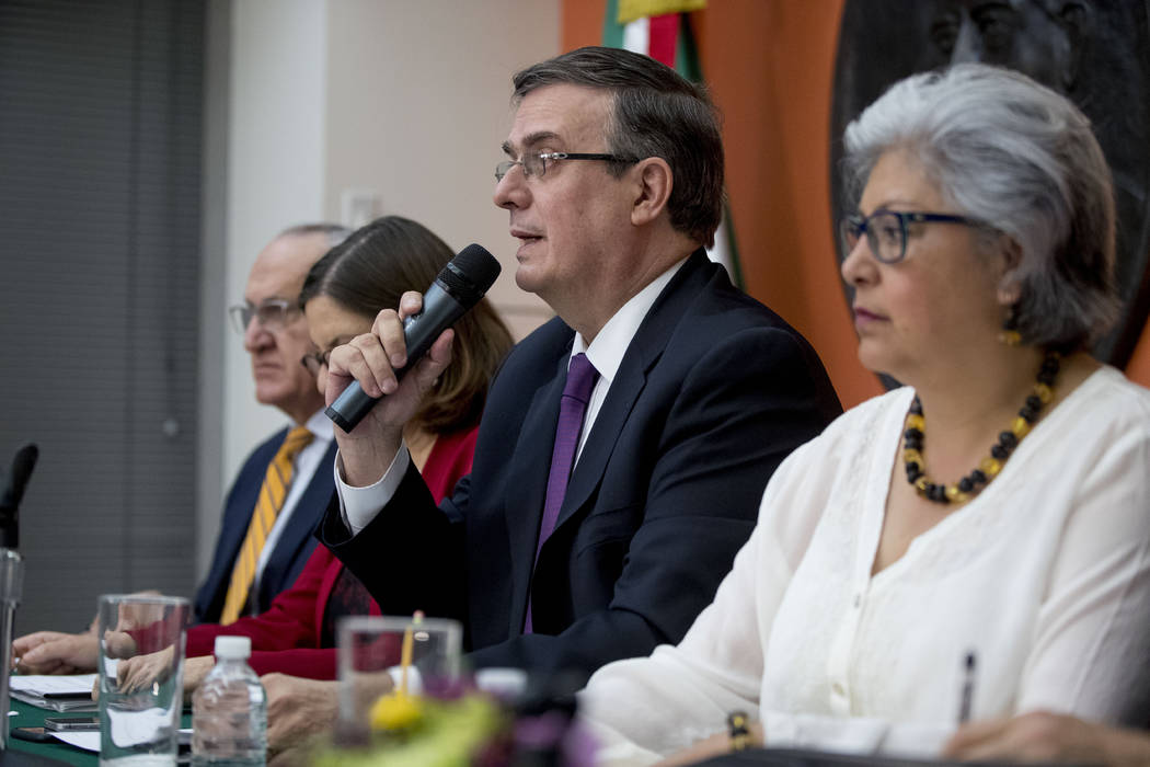 Mexican Foreign Affairs Secretary Marcelo Ebrard, center, speaks at a news conference at the Me ...