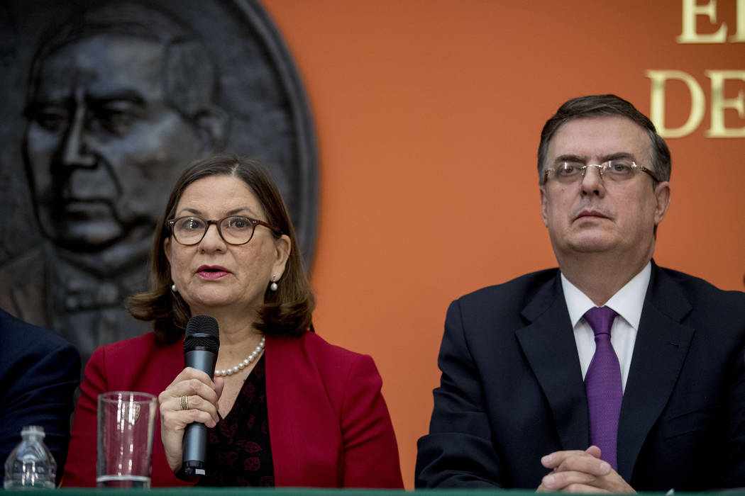 From left, Mexican Ambassador Martha Barcena Coqui, left, accompanied by Mexican Foreign Affair ...