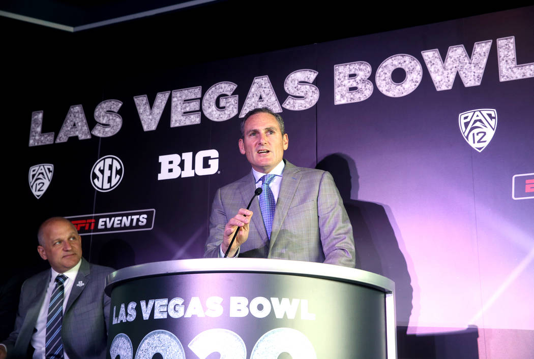 Pac-12 Commissioner Larry Scott, right, and Raiders President Marc Badain during announcement f ...