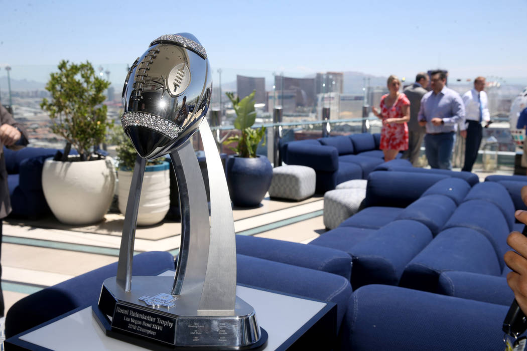 A trophy during an announcement for the Mitsubishi Las Vegas Bowl during a news conference in t ...