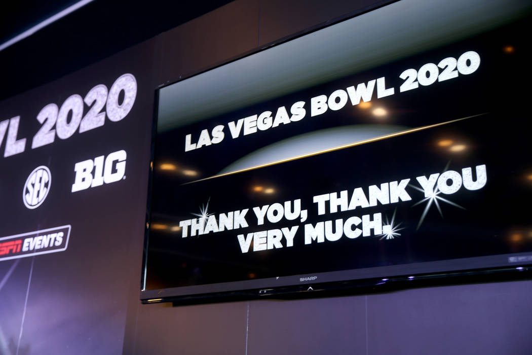 A screen during an announcement for the Mitsubishi Las Vegas Bowl during a news conference in t ...