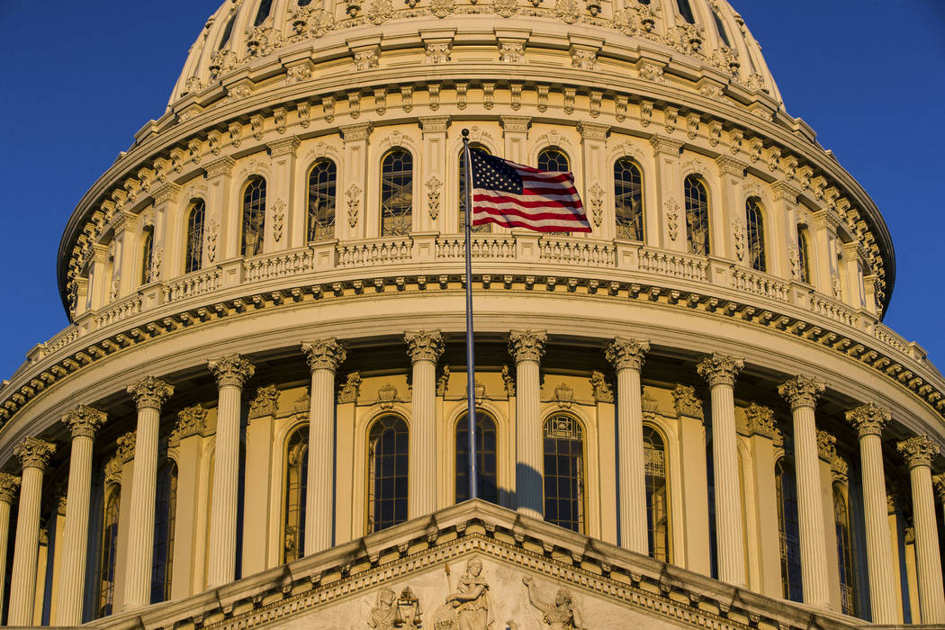 FILE - In this March 24, 2019, file photo, the U.S Capitol is seen at sunrise in Washington. Pr ...