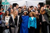 Young plaintiffs stand Oct. 29,2018, on the steps of the United States District Courthouse duri ...
