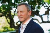 FILE - In this April 25, 2019, file photo, actor Daniel Craig poses for photographers during th ...
