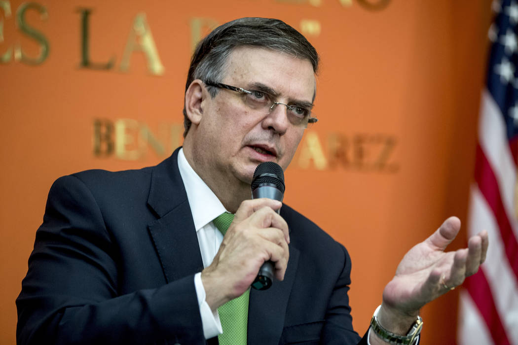Mexican Foreign Affairs Secretary Marcelo Ebrard, right, speaks at a news conference at the Mex ...