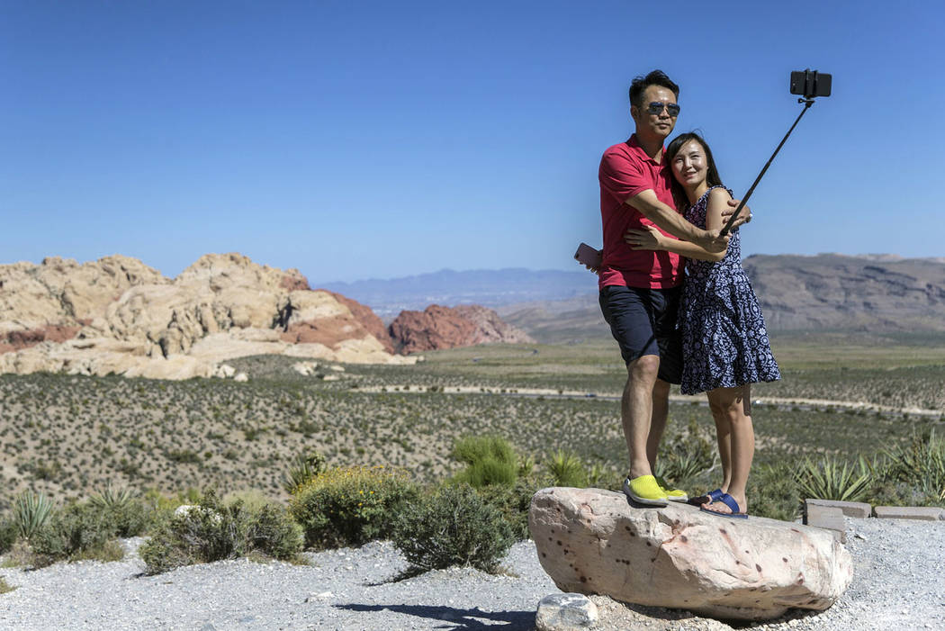 Steven and Jessi Kang, from Irvine, Calif., take a selfie during "National Get Outdoors Da ...