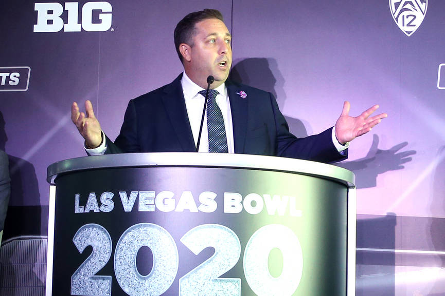 Pete Derzis of ESPN Events, from left, Steve Hill, CEO and president of the Las Vegas Conventio ...