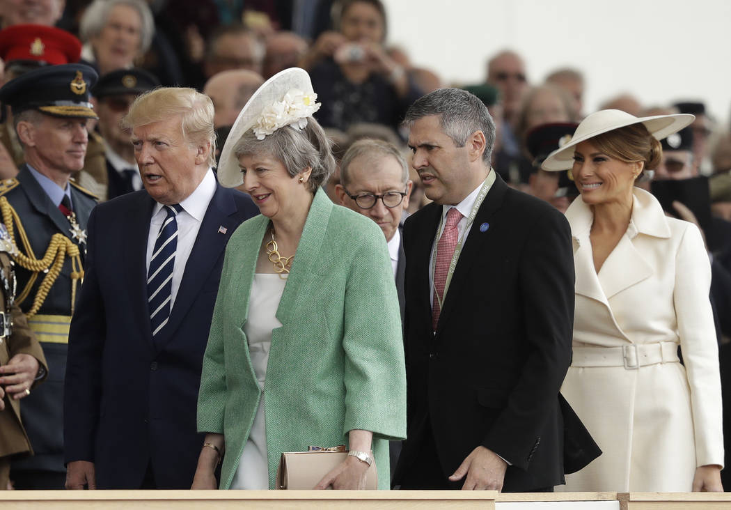 President Donald Trump, British Prime Minister Theresa May, second left, and first lady Melania ...
