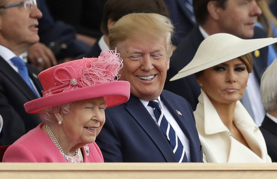 Queen Elizabeth II, President Donald Trump and first lady Melania Trump, from left, attend an e ...