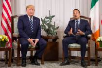 President Donald Trump listens as Irish Prime Minister Leo Varadkar, speaks before a meeting at ...