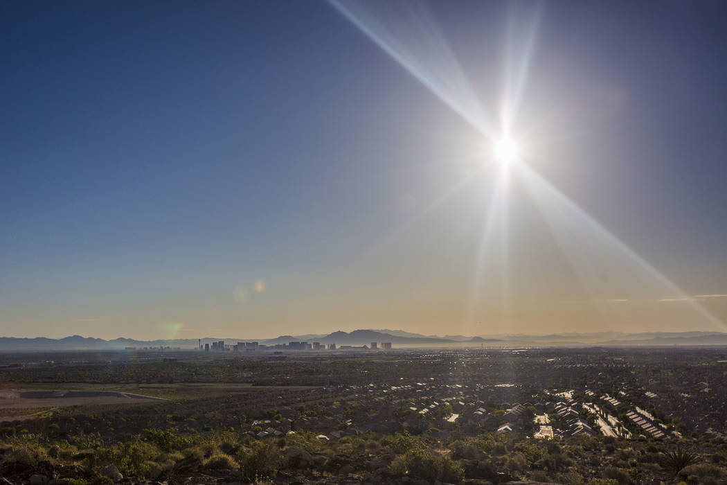 The sun rises over the southwest Las Vegas Valley on Wednesday, June, 5, 2019, in Las Vegas. Th ...