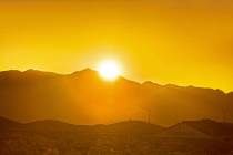 The sun rises in the northwest Las Vegas Valley on Wednesday, June, 5, 2019, in Las Vegas. The ...