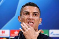 Cristiano Ronaldo attends a press conference at Old Trafford, Manchester, England, Oct. 22, 201 ...