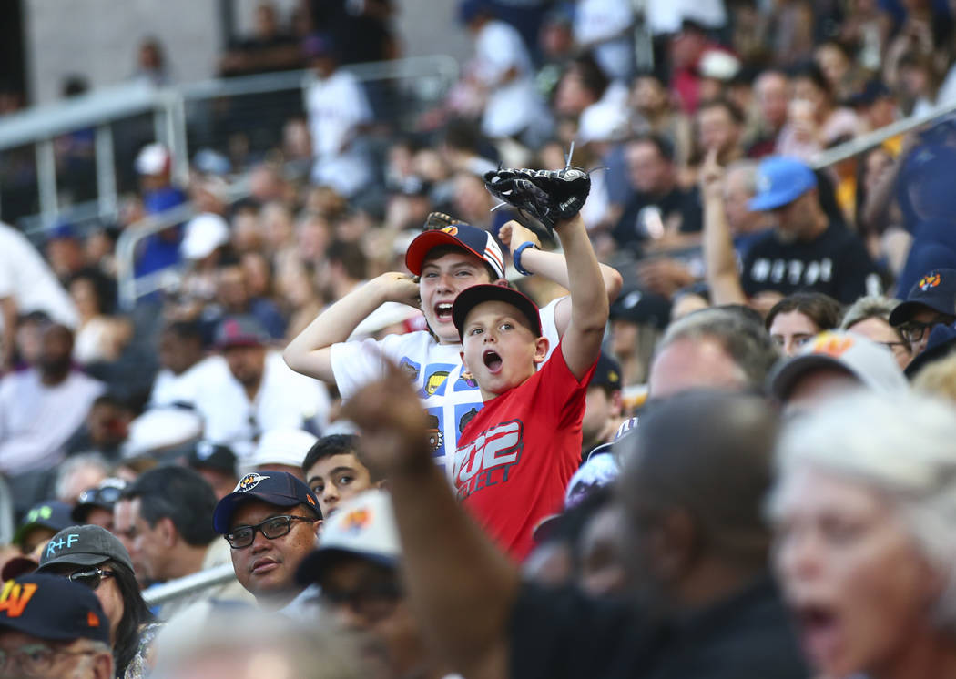 Las Vegas Aviators fans cheer as the team plays against Round Rock Express in "Reyes de Pl ...